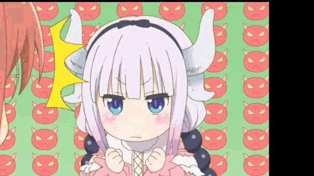 a little girl with horns is standing in front of a pattern of red cats