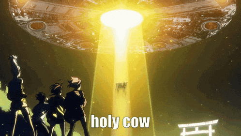 a group of people standing in front of a light that says " holy cow "