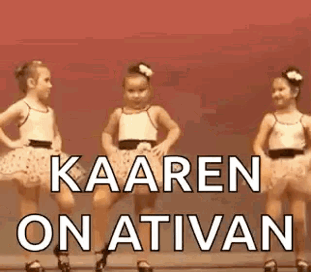 two little girls are dancing together and the words kaaren on ativan are written on the screen .