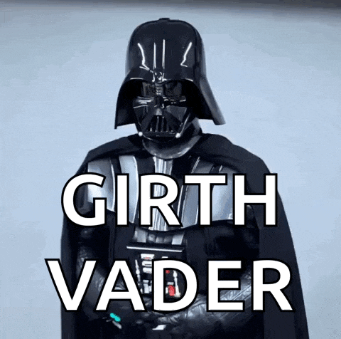 a man in a darth vader costume stands in front of a white background