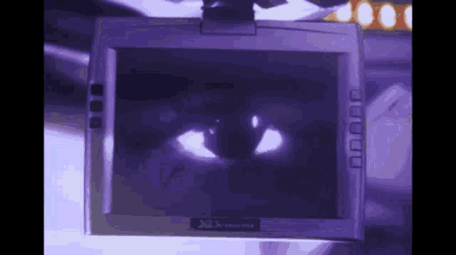 a computer monitor with a purple background and the word xtreme on the bottom