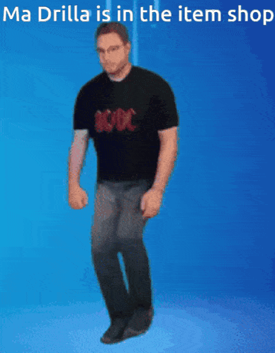 a man wearing a black ac dc shirt is standing on a blue background