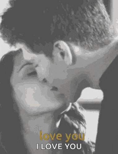 a black and white photo of a man and woman kissing with the words " love you i love you " written below them