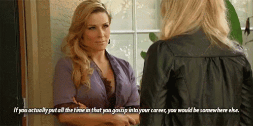 two women are talking to each other and one of them is talking about gossiping into her career