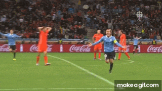 a soccer game is being played in front of a coca cola advertisement