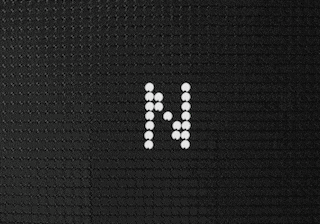 the word dream is written in white on a black background