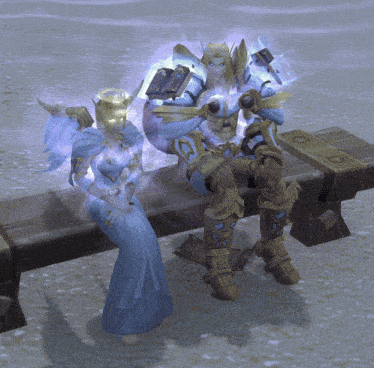 a woman in a blue dress sits next to a man in gold armor