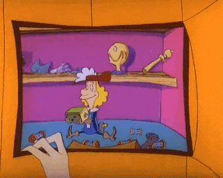 a cartoon character is sitting in a purple room holding a sword and a bottle .