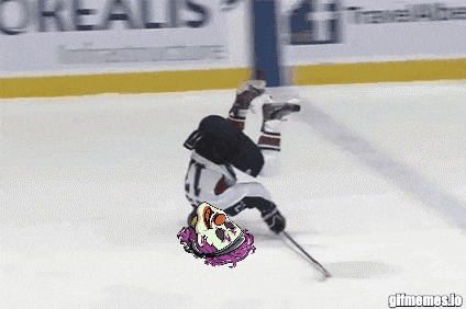 a hockey player is upside down on the ice in front of an advertisement for oreal