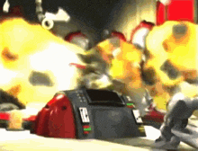 a blurred image of a video game scene with a red object in the foreground and a yellow object in the background .