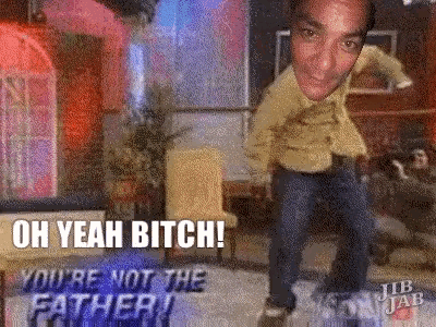 a man is dancing in a living room with the words oh yeah bitch you 're not the father
