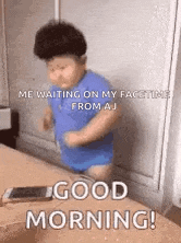a little boy in a blue shirt is standing on a bed and says `` me waiting on my facetime from aj good morning ! ''