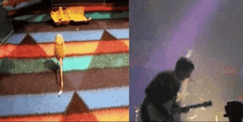 a blurred image of a person playing a guitar next to a colorful carpet