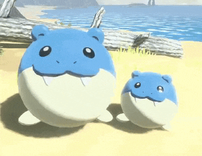 two blue and white cartoon animals are standing next to each other on a sandy beach .