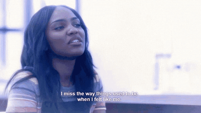 a woman in a striped shirt says " i miss the way things used to be when i felt like me "