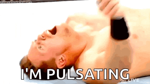 a shirtless man is laying on his back with his mouth open and the words i 'm pulsating above him