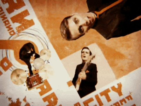 a man playing drums and another man playing guitar on a poster that says city
