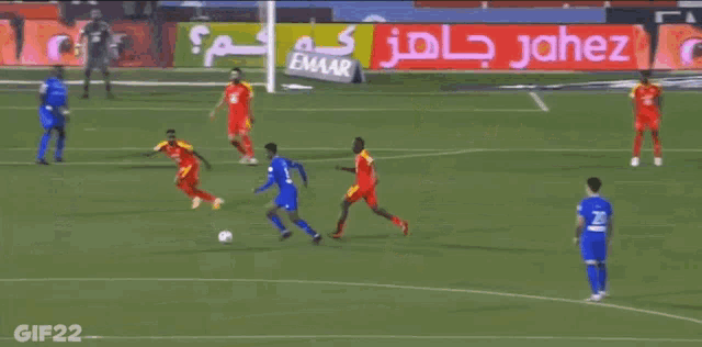 a group of soccer players on a field with a gif22 watermark