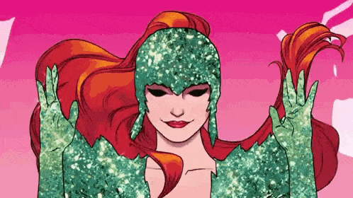 a woman with red hair and green gloves is wearing a poison ivy costume and giving a peace sign .
