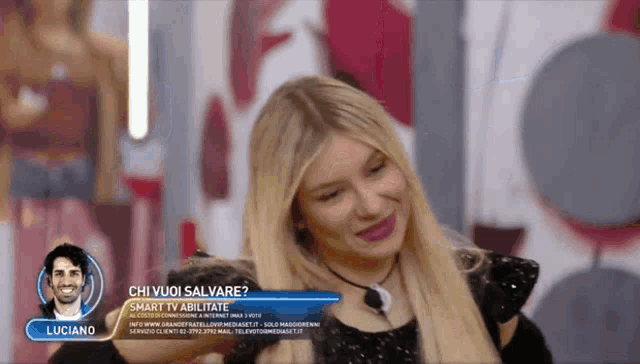 a man and a woman are on a tv show and the man is called luciano