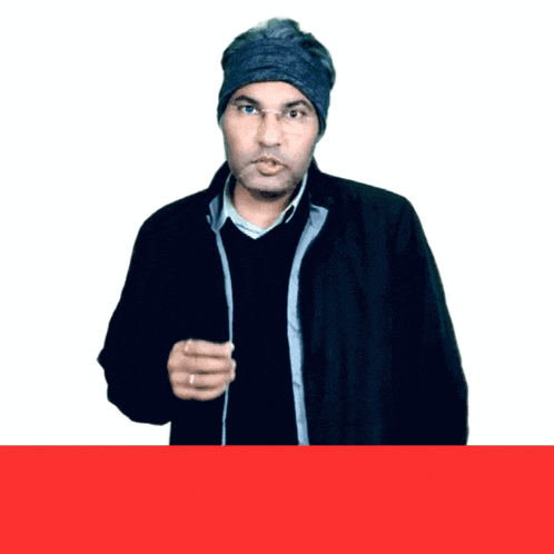 a man wearing a beanie and glasses is standing in front of a red border