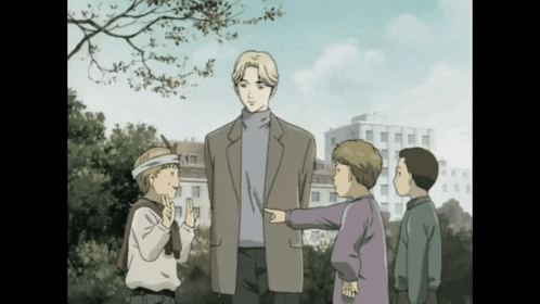a group of children standing around a man with a bandage on his head