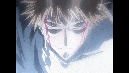 a close up of a person 's face with blood coming out of his eyes