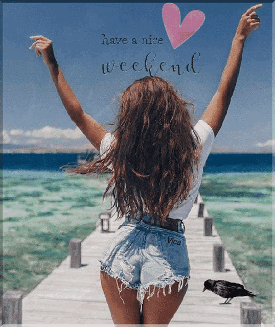 a woman standing on a pier with her arms outstretched and the words have a nice weekend above her