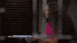 a woman is reading a menu for a restaurant called teas coco