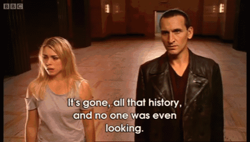 a man and a woman are standing next to each other with the words it 's gone all that history