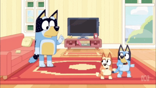 a cartoon of three dogs standing in a living room