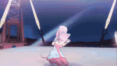 a girl with pink hair and a white tail is dancing on a stage