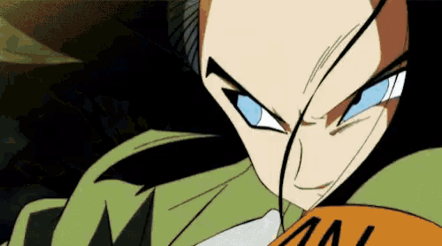 a close up of a cartoon character 's face with blue eyes and a green shirt .
