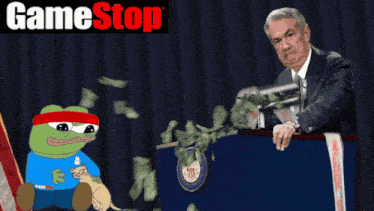 a man is giving a speech in front of a podium with a game stop logo behind him