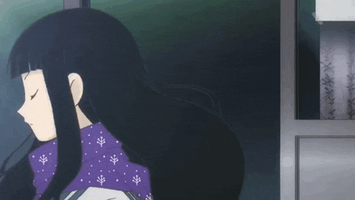 a girl with black hair and a purple scarf