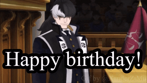 a man in a suit stands in front of a crowd and says happy birthday