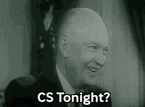 a man in a suit and tie is smiling and saying cs tonight .