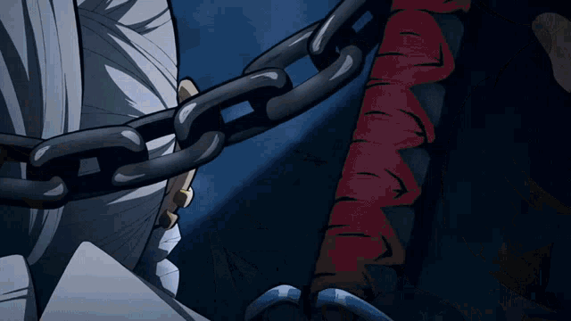 a person is chained to a sword with a bandaged arm