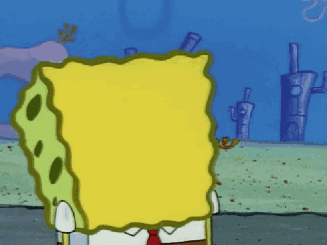 a close up of a cartoon character named spongebob wearing a red tie