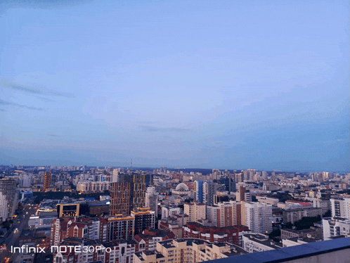 an aerial view of a city taken by an infinix note30pro