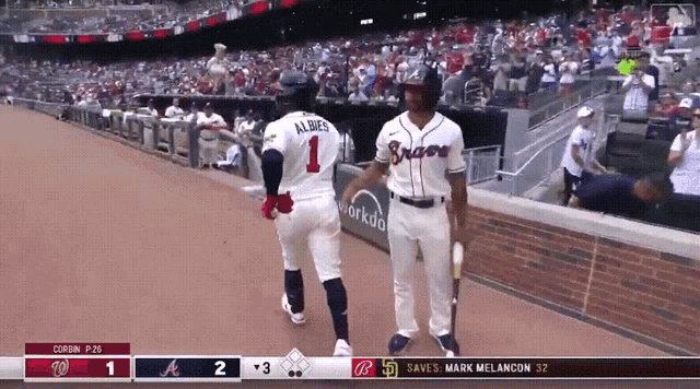 a baseball player with the number 1 on the back of his uniform