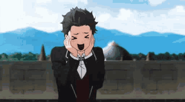 a man in a suit and tie is making a funny face while standing on a balcony .