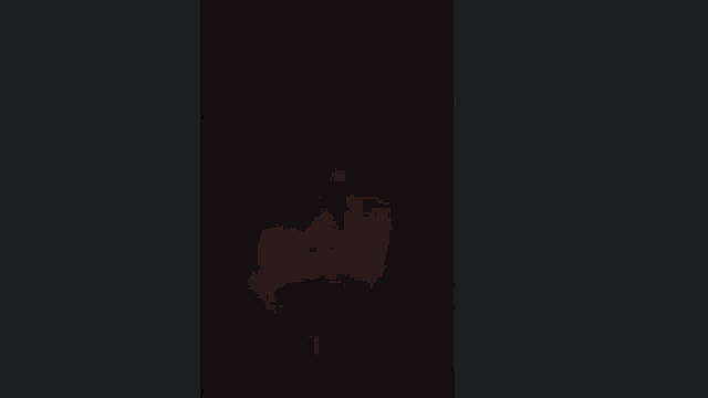 a blurred image of a person giving the middle finger in the dark