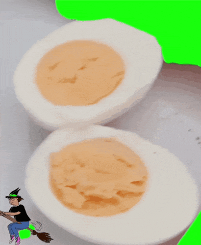 two hard boiled eggs with a witch on a broom in the background