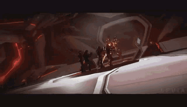a group of people are standing in a dark room with the word levia on the bottom