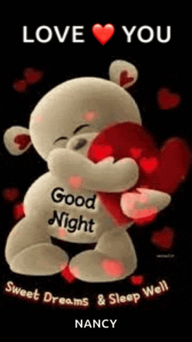 a teddy bear is hugging a red heart with the words `` love you `` written on it .