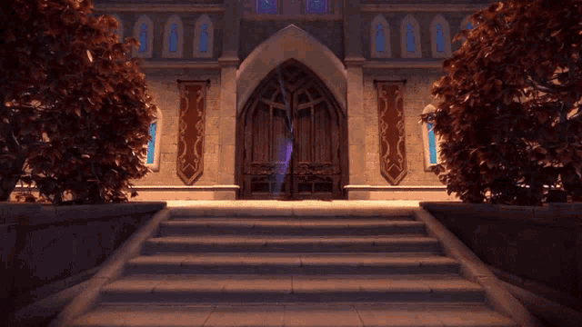 a castle with stairs leading up to a doorway