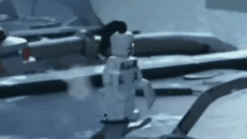 a close up of a lego figure standing on top of a boat .