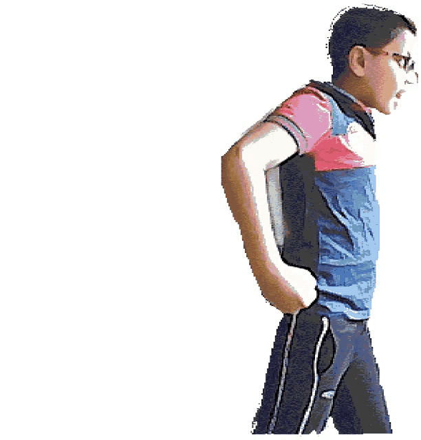 a boy with his hands on his hips is wearing a red and blue shirt