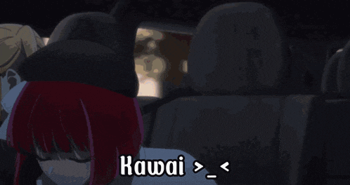 a girl with red hair is sitting in a car with the word kawai on the bottom